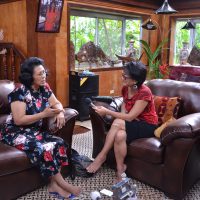 Noe Tanigawa (right) interviews Bilung Gloria Salii. Also called Queen Bilung, she is the highest ranking woman in Koror.