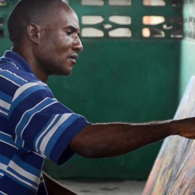 Local artist painting in Monrovia