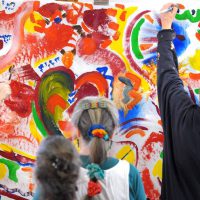 Local residents learn about Tunisian Collaborative Painting