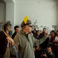 Artist Dennis Lee Mitchell gives a demonstration of his ‘smoke drawing’ technique to vocational high school students at OSTIM, the Ankara studio of Turkish artist Turhan Çetin.