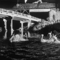 O Winston Link, Hawksville Creek Swimming Hole, Luray, Virginia, Gelatin silver photograph, 23 5/16 x 27 11/16 in.  (59.2 x 70.3 cm) framed, Courtesy of Norfolk Southern Corporation, Norfolk, Virginia