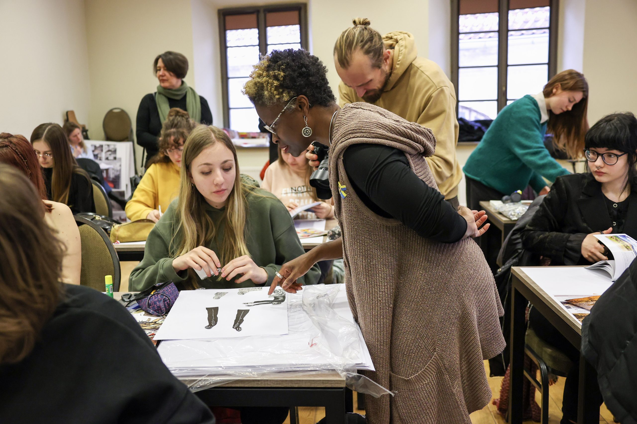 That afternoon, Charlton lead a practice-based workshop with students at European Humanities University where the students used collage to explore what belonging means to them.