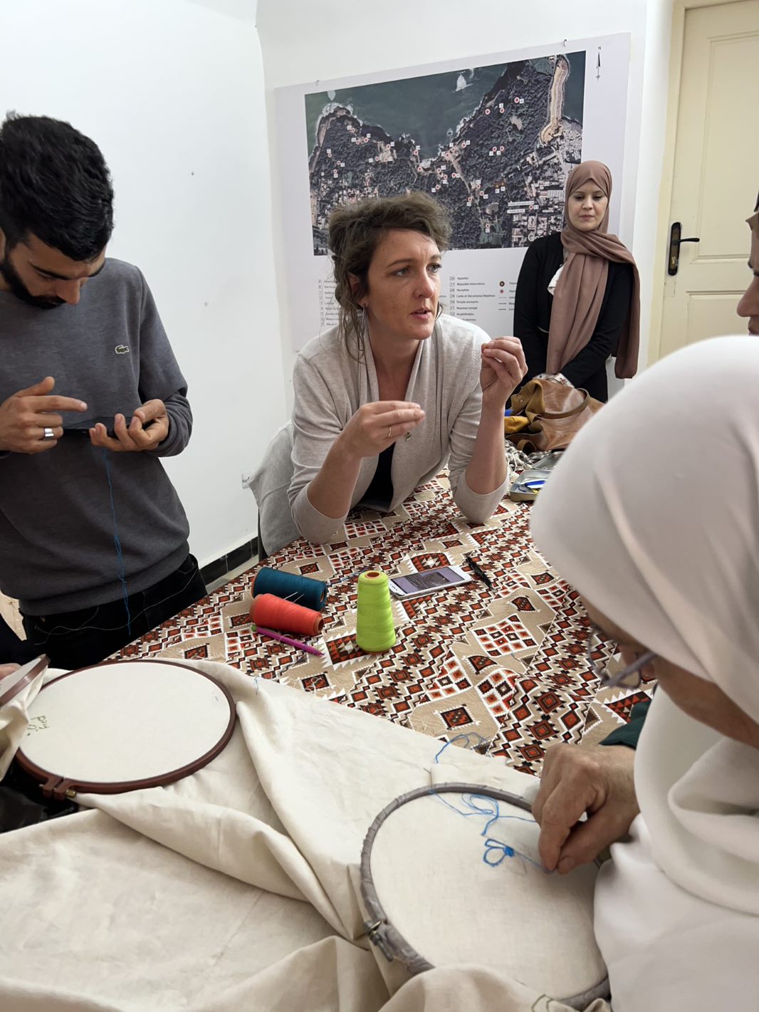 Also in Tipaza, Fayle led an embroidery workshop with the same group in which they all worked on elements of the same overall piece, a tablecloth.