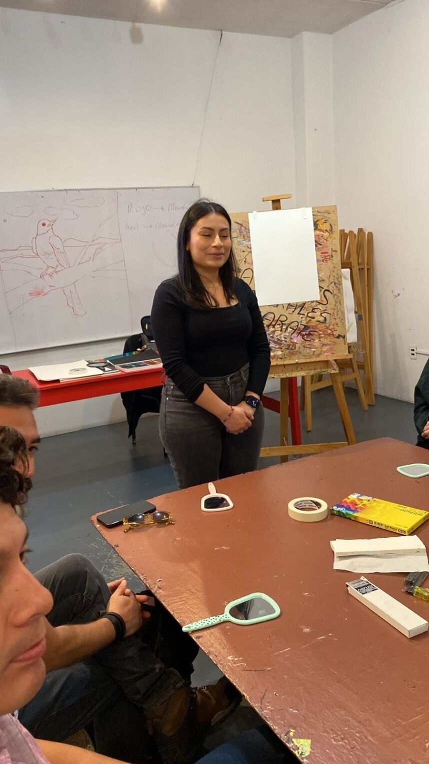Artist Arely Morales leads a workshop for young students where they learned the foundations of self-portraiture and its potential for self-expression.